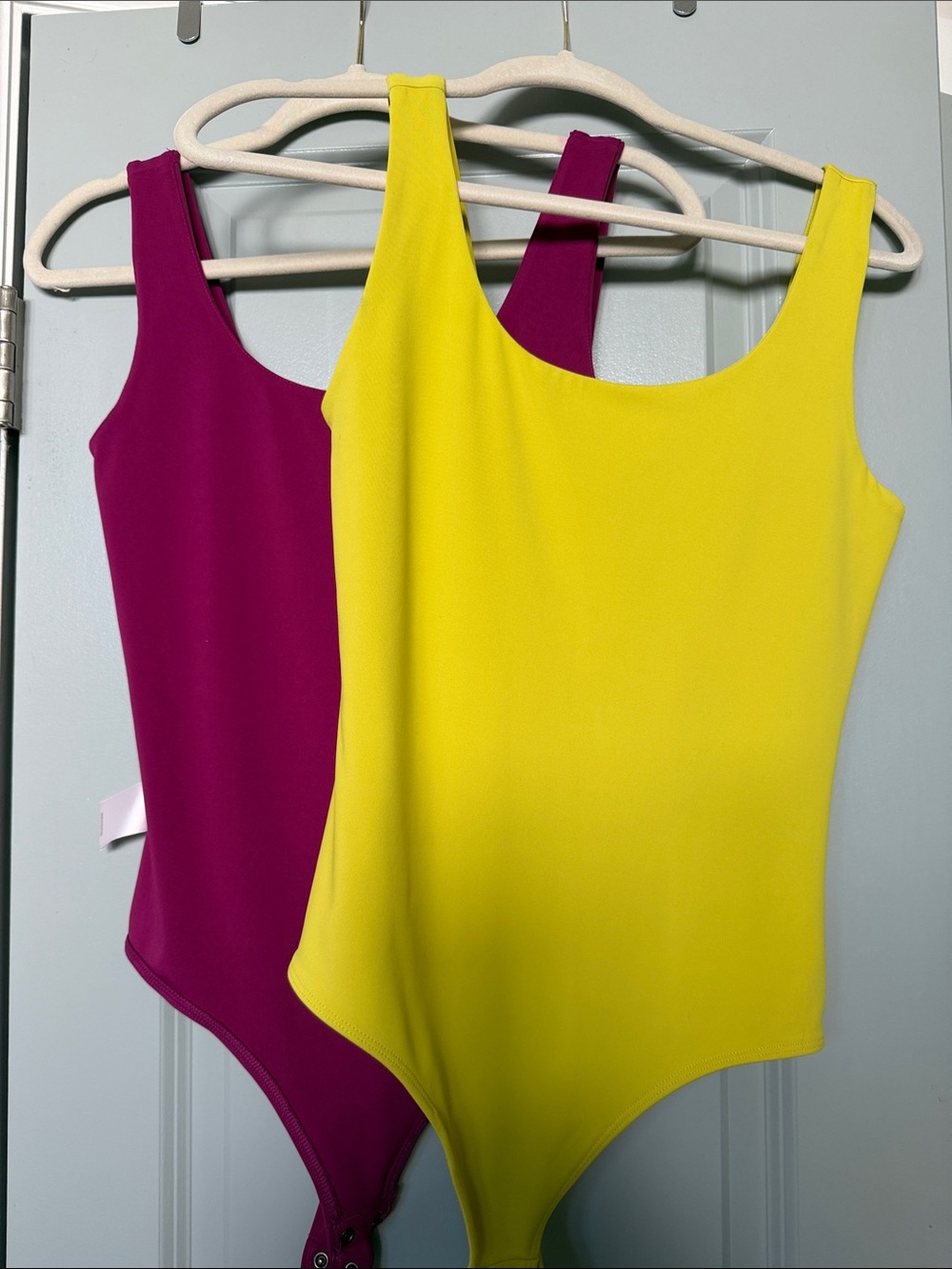 2 express bodysuits - Yellow & Magenta